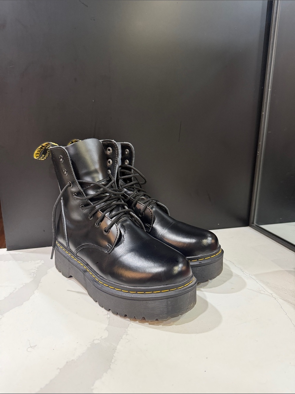 Dr. Martens Black Leather Platform Lace-Up Boots with Yellow Stitching